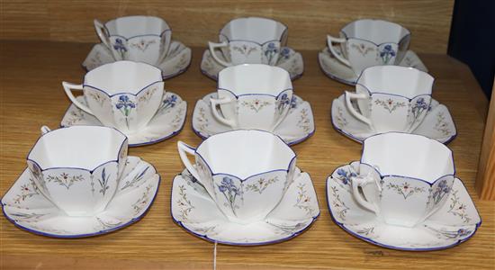 A Shelleys 1930s Blue Iris pattern Queen Anne style part tea service comprising nine cups and nine saucers